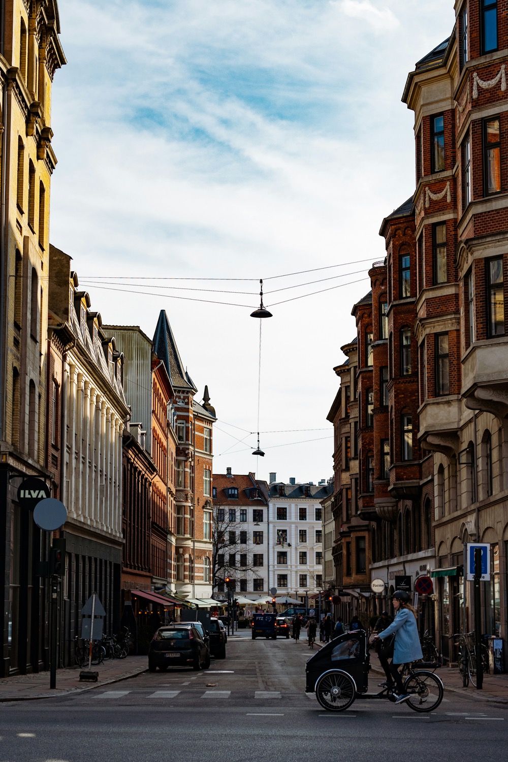 Bicycles parked along a quiet Copenhagen street