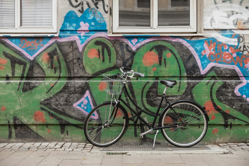 Cyclists riding through a Copenhagen street