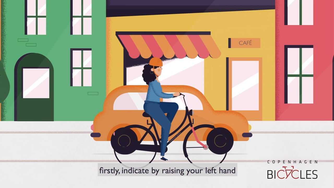 Still from the Copenhagen Bicycles animation showing a cyclist signalling a left turn